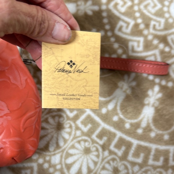 Patricia Nash Embossed Coral Wristlet - Picture 2 of 14
